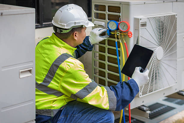 Professional Heat Pump Repair technician working in Greendale, WI